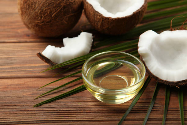 istock coconut oil and coconuts on the table 1263650141