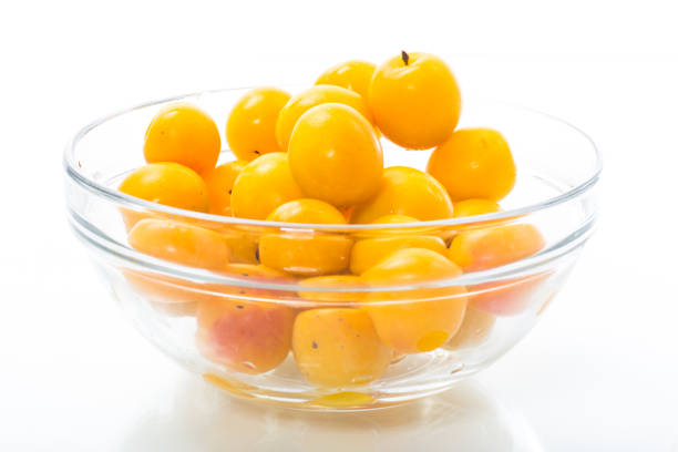 yellow cherry plums isolated on the white background
