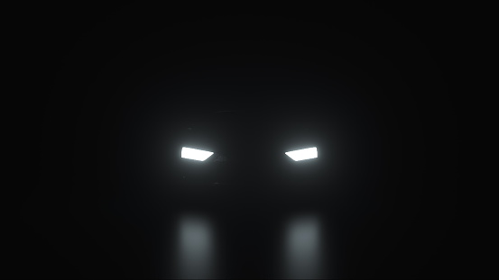 Car headlights in the dark, computer generated. 3d rendering modern background
