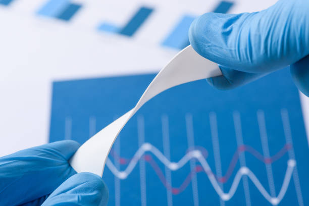 istock Novel flexible plastic material in scientist hands 1263655024