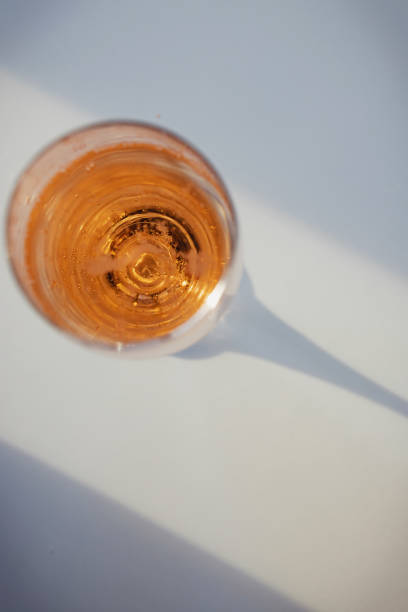 istock Glass with rose sparkling wine on the white table with 1263658016