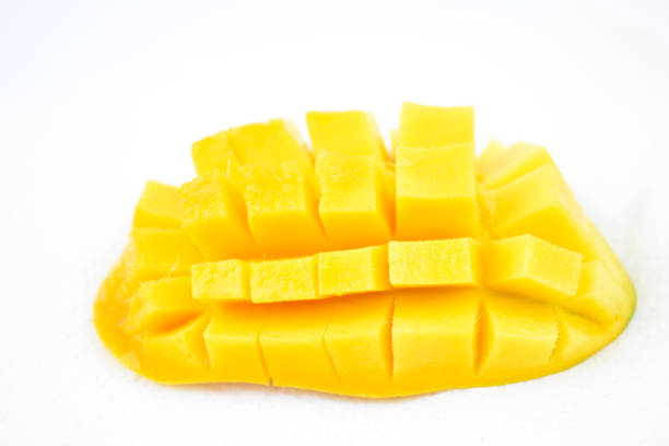 istock Mango fruit with mango cubes and slices. Isolated on a white background 1263658277