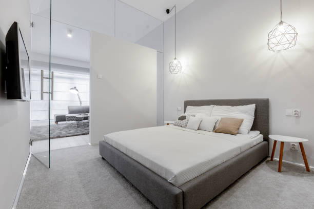 istock Bright bedroom with glass doors 1263658330