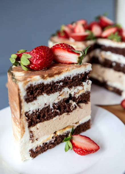 istock strawberry cheesecake cake chocolate, cream and decoration 1263663787