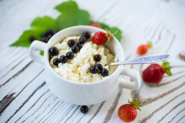 istock fresh homemade cottage cheese with summer berries 1263664866