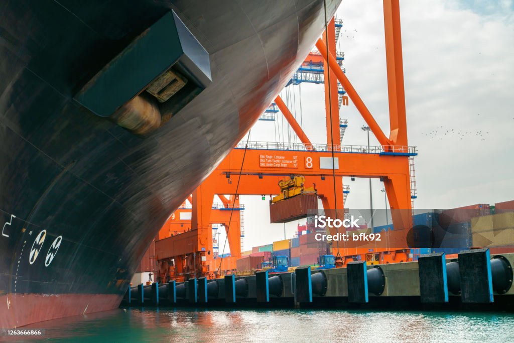 Container Loading Go Down Container Ship In Loading Unloading At Port Stock Photo - Download ...