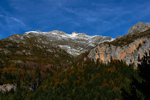 Rolling landscape of Dolomites mountains shot on camera film