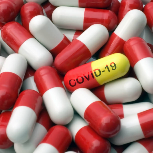 istock Inscription COVID-19 capsule pills 1263670000