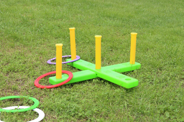 istock children's play ring toss on green grass 1263671236