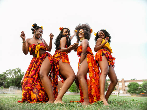istock Young black women dancing in the field 1263672762