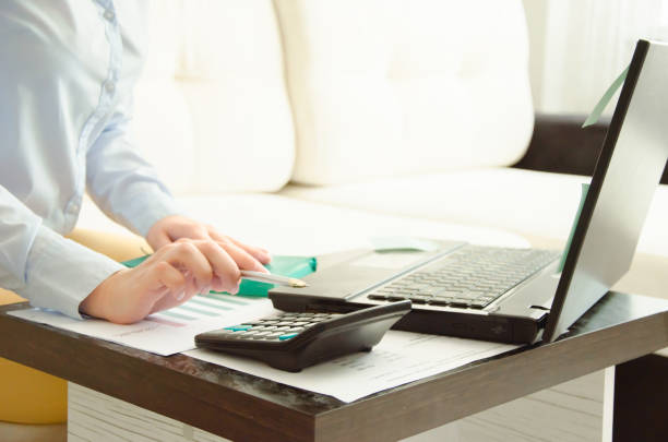 istock business woman working at home on the computer. online work 1263673019