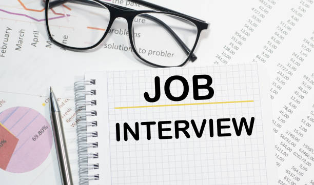 istock JOB INTERVIEW writing on the Notepad view from above business concepts 1263674217