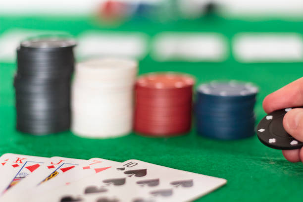 istock Playing cards and casino chips 1263675183