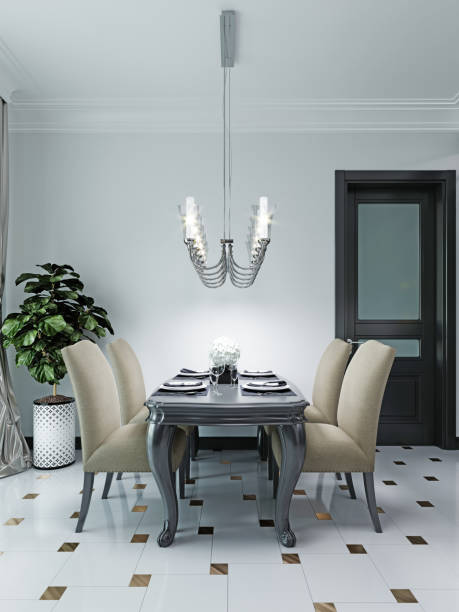 istock Black dining table with four soft chairs in beige. The interior is in a classic style. 1263675838