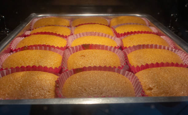 istock Mini carrot cakes in the oven for later becoming cupcakes 1263676055