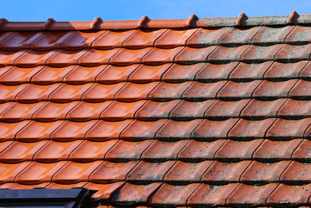 Roof cleaning with high pressure, before and after stock photo