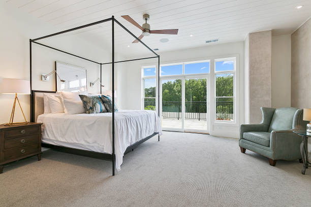 Canopy bed in bright and cheery bedroom