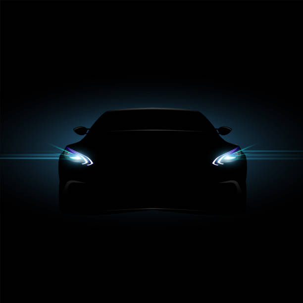 istock Vector silhouette of a sports car with xenon headlights on with blue background 1263678734