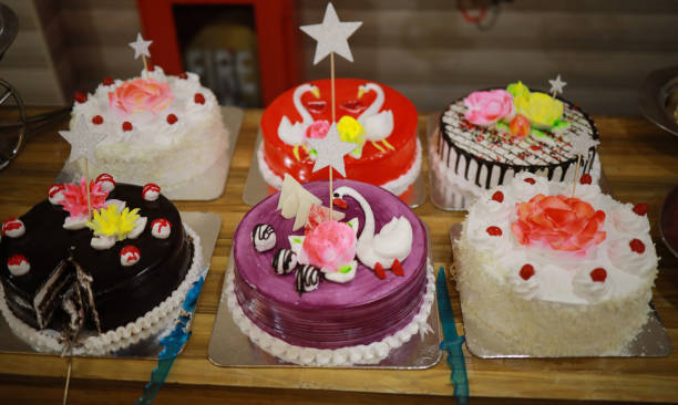 istock Indian reception wedding cake with roses and donuts.Beautiful wedding cake in Romantic styles. 1263678834