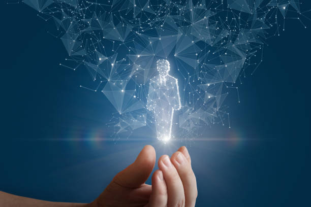 istock Hand shows a hologram of a human worker . 1263680638