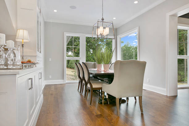 istock Big windows bring in natural sunlight in spacious dining room 1263682805