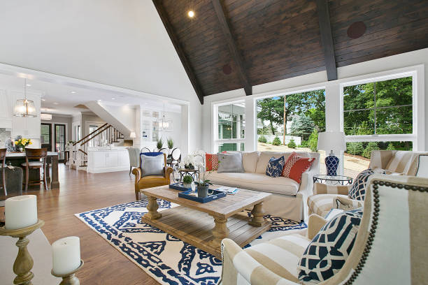 istock Dark rich wood vaulted ceiling in newly constructed home 1263682806