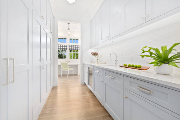 Butler pantry with white cabinetry
