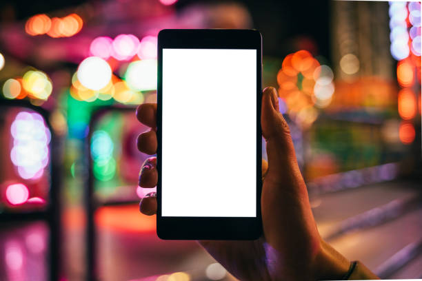 istock Close-up woman's hand holding mobile phone 1263684844