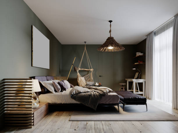 istock Boho style bedroom interior with olive color walls and two leather ottomans. 1263686823