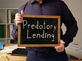 Predatory Lending is shown on the conceptual business photo
