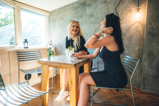 istock Two young women in cafe 1263687650
