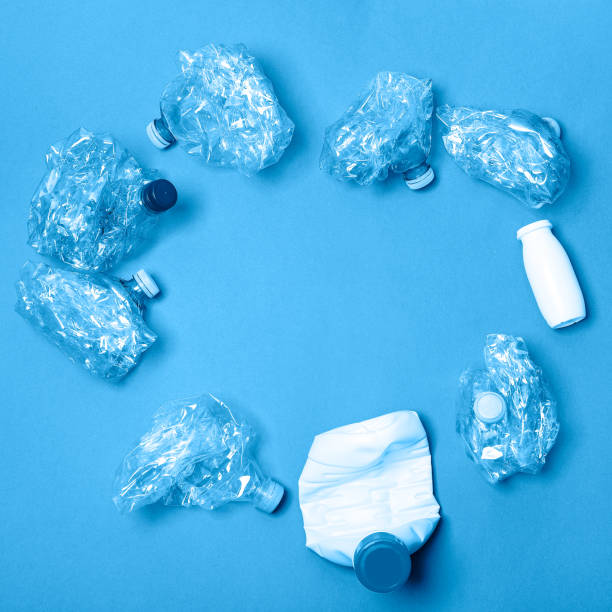 istock Recycled materials on a blue background view from above 1263688020