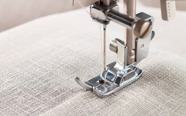 istock Close-up of modern sewing machine presser foot and needle 1263688929