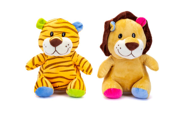 istock Tiger and stuffed lion with shadow sitting on white background. 1263688937