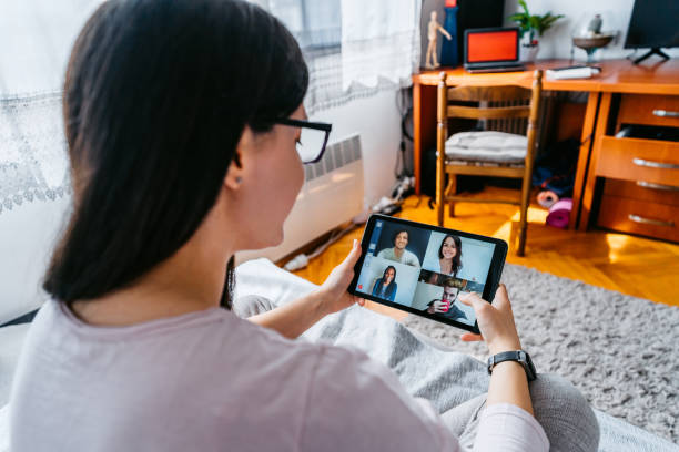 istock Woman having a video call with friends 1263689204