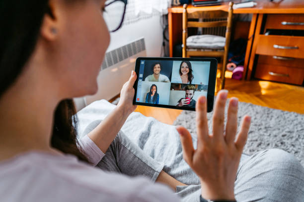 istock Woman having a video call with friends 1263689236