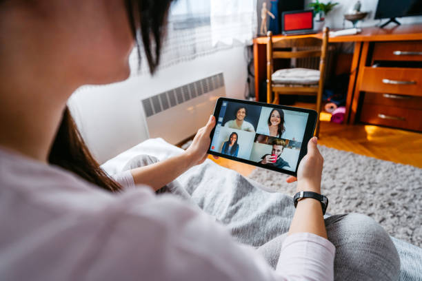 istock Woman having a video call with friends 1263689262