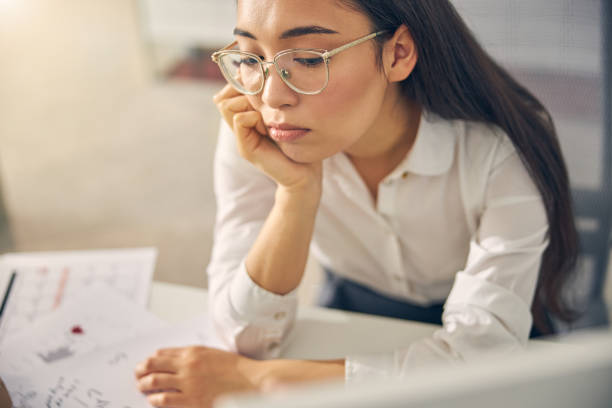 istock Upset international female person looking at her computer 1263689363