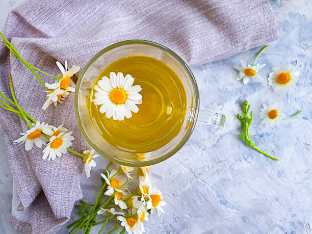 istock chamomile flower tea on concrete background 1263689449