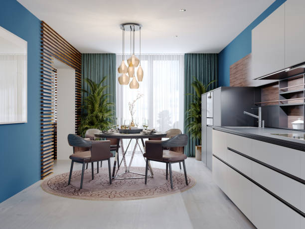 istock Luxurious multi-colored kitchen with dining tables in a new modern style. Furniture in white, black and brown, Walls of blue. 1263690930