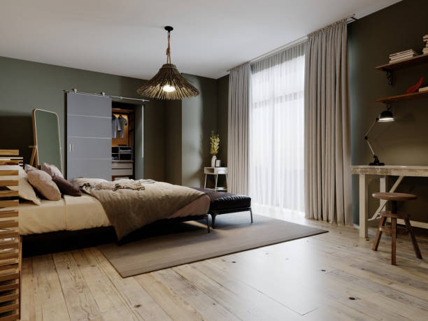 istock Boho style bedroom interior with olive color walls and two leather ottomans. 1263691504