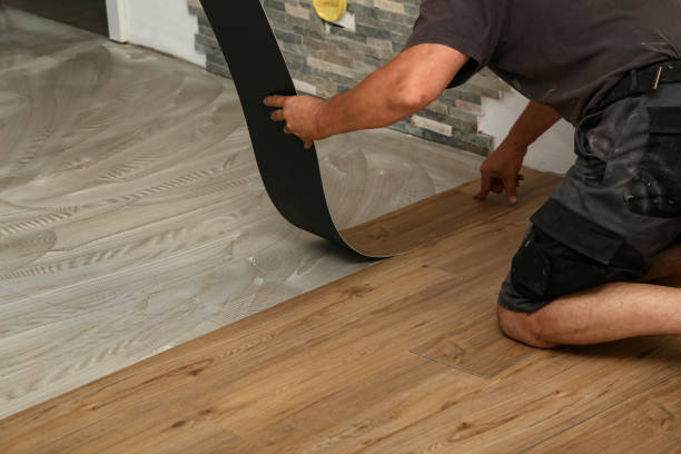 istock The worker installing new vinyl tile floor 1263691795