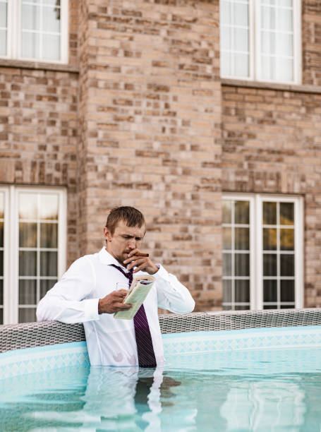 istock Young Oligarch in his pool 1263693430