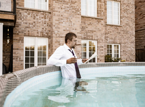 istock Young Oligarch in his pool 1263695436