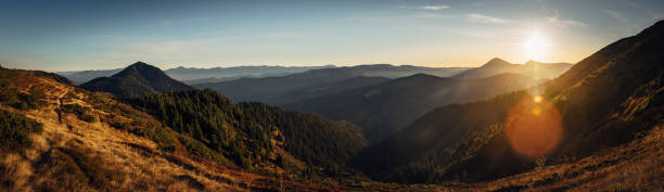 istock Panoramic view of sunrise in Carpathian mountains 1263695546