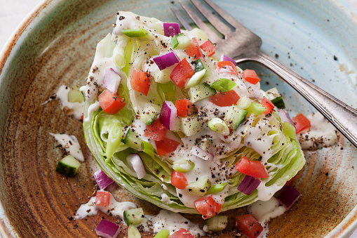 Creamy Ranch Wedge Salad with Tomatoes, Cucumber, Red Onion and Scallions
