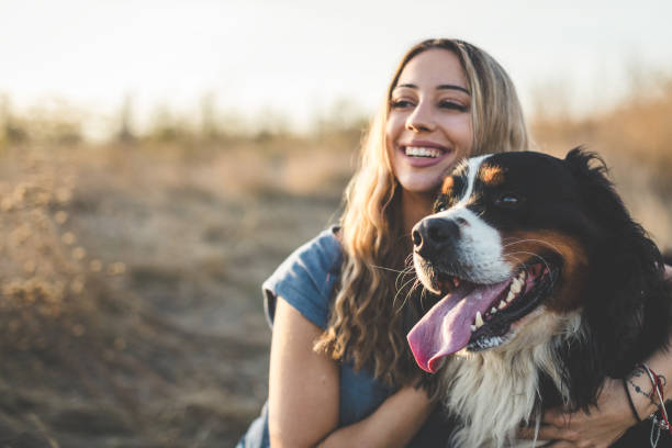 istock Young woman with dog 1263697064