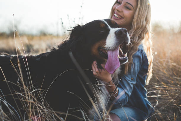 istock Young woman with dog 1263697145
