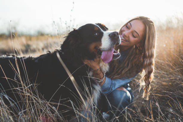 istock Young woman with dog 1263697203