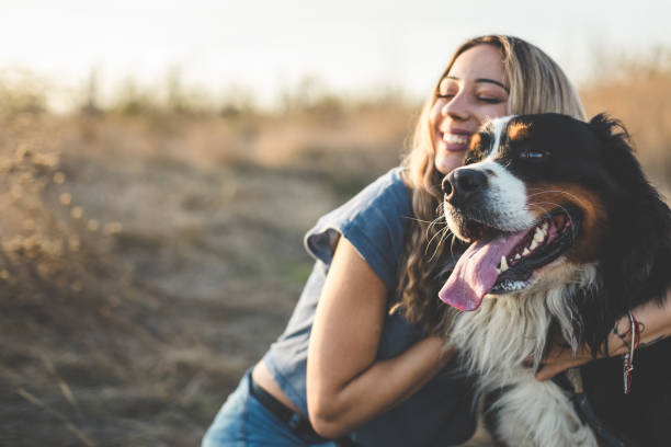 istock Young woman with dog 1263697226